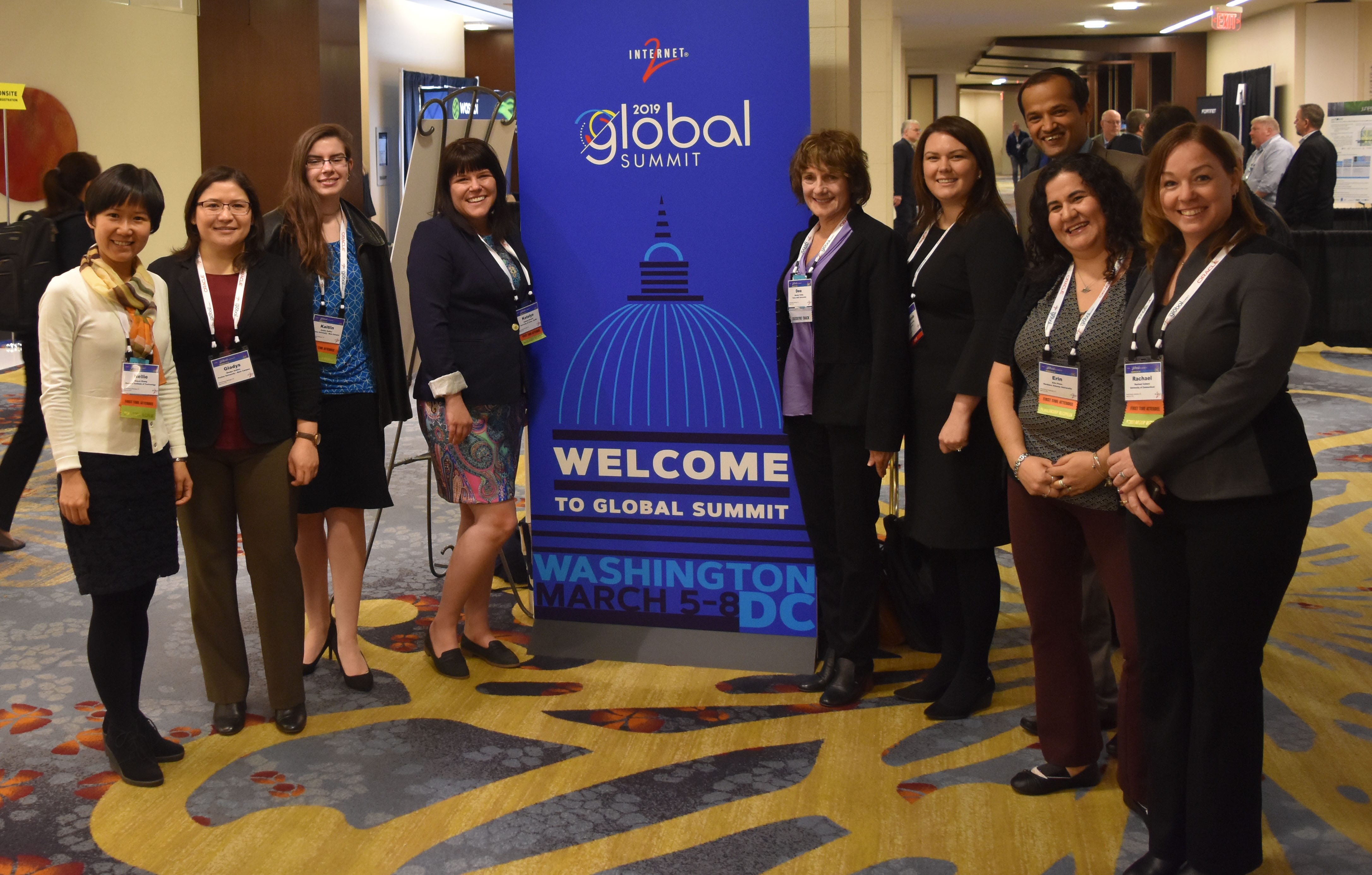 Group of Global Summit attendees smiling