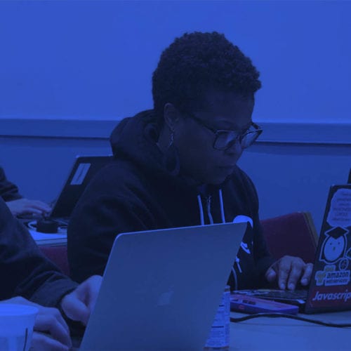 Close-up of three people at a software training session.